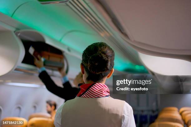 passenger travel via commercial air plane. - steward stockfoto's en -beelden