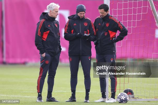 Julian Nagelsmann , head coach of FC Bayern München looks on during a training session ahead of their UEFA Champions League round of 16 match against...