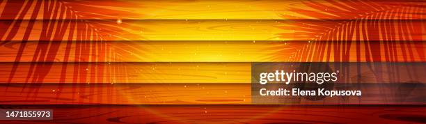 tropical abstract wooden background with shadow of palm trees. - hot summer text stock illustrations