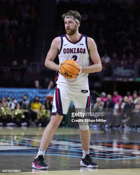 Drew Timme of the Gonzaga Bulldogs looks to pass against the San Francisco Dons in the second half of a semifinal game of the West Coast Conference...