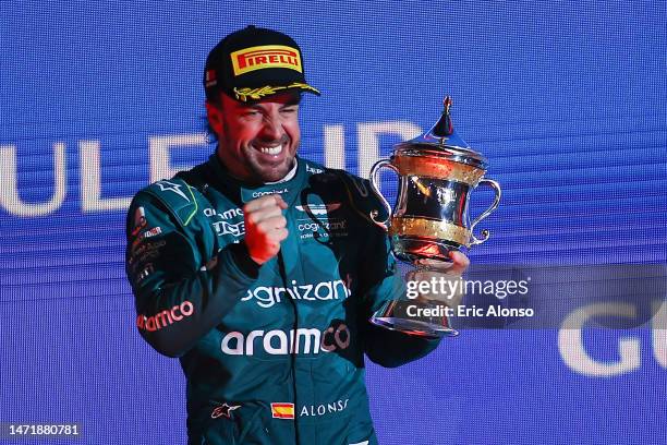 Fernando Alonso of Spain and Aston Martin celebratin on the podium during the F1 Grand Prix of Bahrain at Bahrain International Circuit on March 05,...