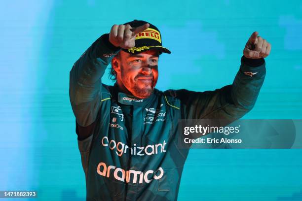 Fernando Alonso of Spain and Aston Martin celebrating on the podium during the F1 Grand Prix of Bahrain at Bahrain International Circuit on March 05,...