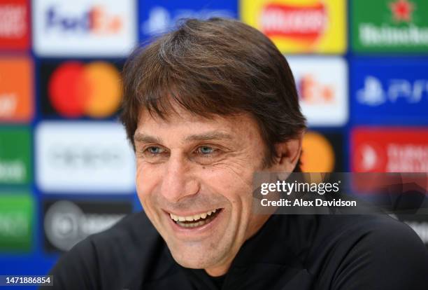 Antonio Conte, Manager of Tottenham Hotspur, smiles as they speak to the media during a Tottenham Hotspur Press Conference of their UEFA Champions...