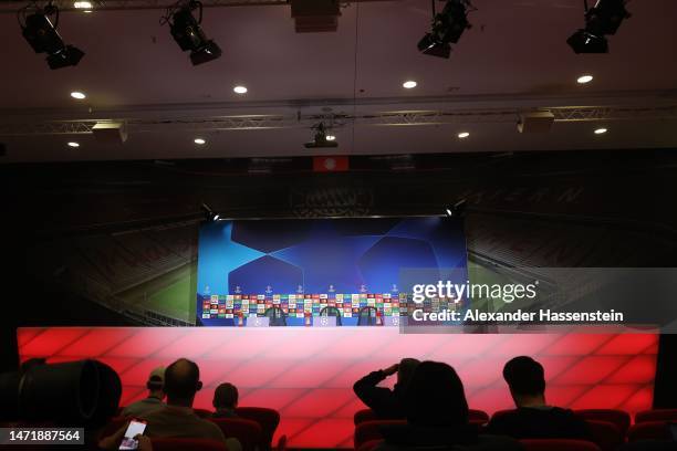 The empty podium is seen prior to a FC Bayern München press conference ahead of their UEFA Champions League round of 16 match against Paris...