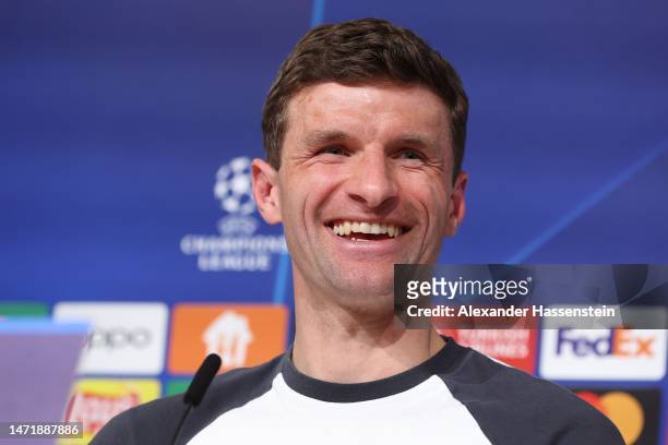 Thomas Müller of FC Bayern München smiles during a FC Bayern München press conference ahead of their UEFA Champions League round of 16 match against...