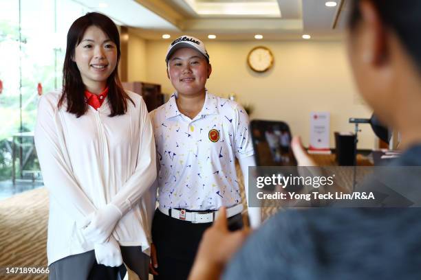 Shanshan Feng of China poses for a photo with Holly Victoria Halim of Indonesia prior to The Women's Amateur Asia-Pacific Championship on The New...