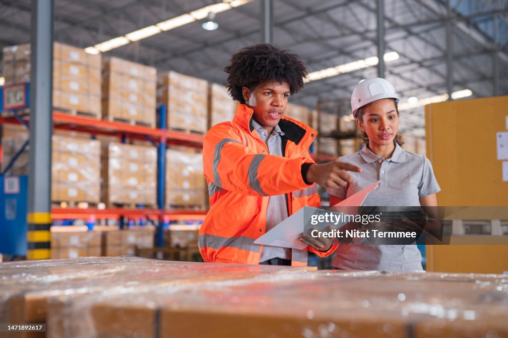 Reduce and Reconcile Damaged Goods Claims More Efficiently in Logistics Operations. Diversity of the Team's logistic operations has a discussion over the packaging to control and prevent damage during loading in a logistics center.