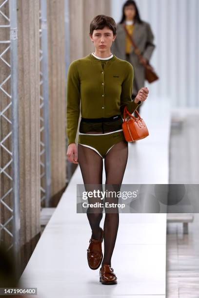 Model walks the runway during the Miu Miu Womenswear Fall Winter 2023-2024 show as part of Paris Fashion Week on March 7, 2023 in Paris, France.