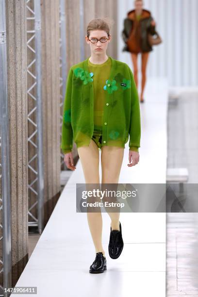 Model walks the runway during the Miu Miu Womenswear Fall Winter 2023-2024 show as part of Paris Fashion Week on March 7, 2023 in Paris, France.