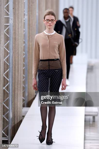 Model walks the runway during the Miu Miu Womenswear Fall Winter 2023-2024 show as part of Paris Fashion Week on March 7, 2023 in Paris, France.