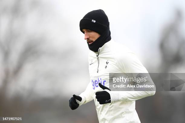 Harry Kane of Tottenham Hotspur looks on during a Tottenham Hotspur training session ahead of their UEFA Champions League round of 16 match against...
