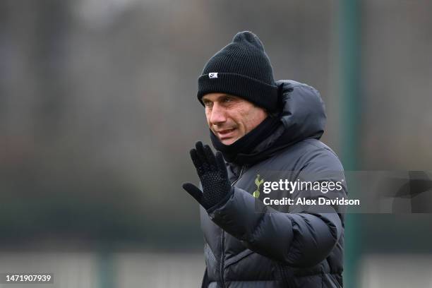 Antonio Conte, Manager of Tottenham Hotspur, waves during a Tottenham Hotspur training session ahead of their UEFA Champions League round of 16 match...