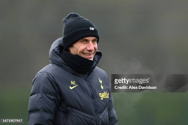 Antonio Conte, Manager of Tottenham Hotspur, smiles during a Tottenham Hotspur training session ahead of their UEFA Champions League round of 16...