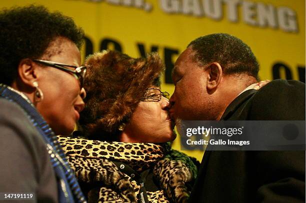 Winnie Madikizela- Mandela embraces the Deputy President Kgalema Motlanthe at tthe opening of the ANC's four-day policy conference held at Gallagher...