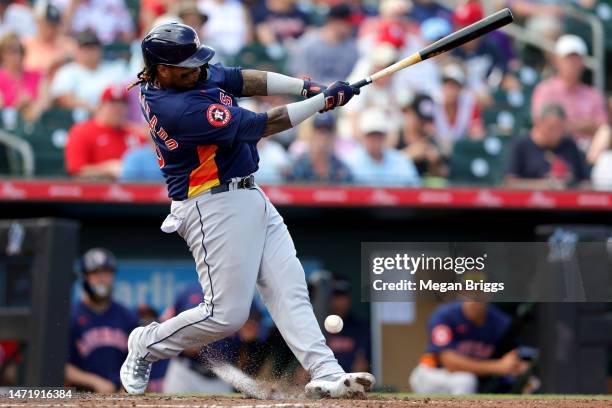 Martin Maldonado of the Houston Astros at bat against the St. Louis Cardinals during the fourth inning of the game at Roger Dean Stadium on March 06,...