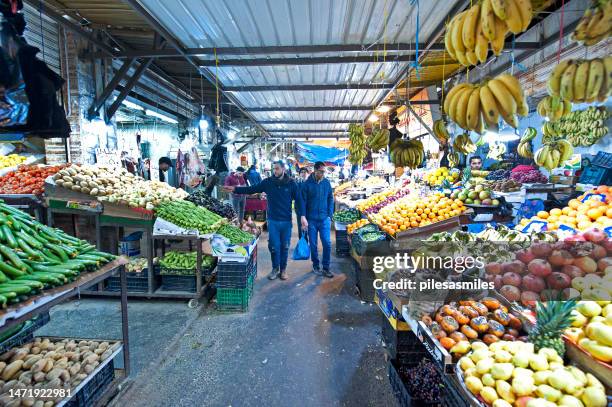 covered vegetable market, the souk, amman city centre, jordan - amman people stock pictures, royalty-free photos & images