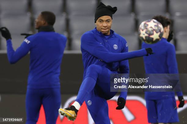 Kylian Mbappe of PSG Paris Saint-Germain plays the ball during a Paris Saint-Germain Training session ahead of their UEFA Champions League round of...