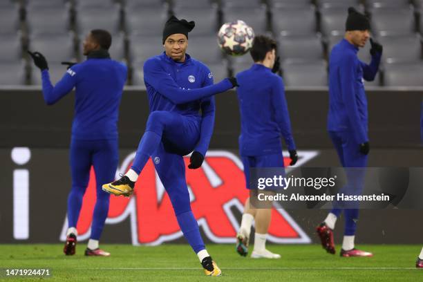 Kylian Mbappe of PSG Paris Saint-Germain plays the ball during a Paris Saint-Germain Training session ahead of their UEFA Champions League round of...