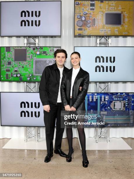 Brooklyn Beckham and Nicola Peltz attend the Miu Miu Womenswear F/W 2023- 2024 show as part of Paris Fashion Week at Palais d'Iena on March 07, 2023...