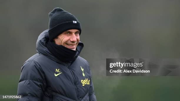 Antonio Conte, Manager of Tottenham Hotspur, smiles during a Tottenham Hotspur training session ahead of their UEFA Champions League round of 16...