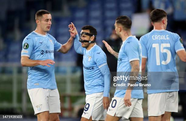 Pedro of SS Lazio celebrates after scoring the team's first goal with teammate Adam Marusic during the UEFA Europa Conference League round of 16 leg...