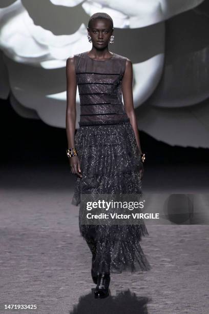 Model walks the runway during the Chanel Ready to Wear Fall/Winter 2023-2024 fashion show as part of the Paris Fashion Week on March 7, 2023 in...