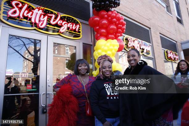 Bevy Smith, Pinky Cole and Melba Wilson attend the opening of the new 'Slutty Vegan' Restaurant In Harlem on March 07, 2023 in New York City.