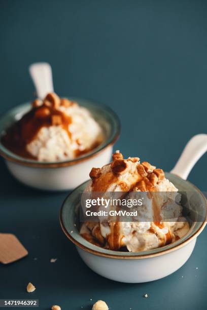 vanilla ice cream with caramel topping - caramel sauce stock pictures, royalty-free photos & images