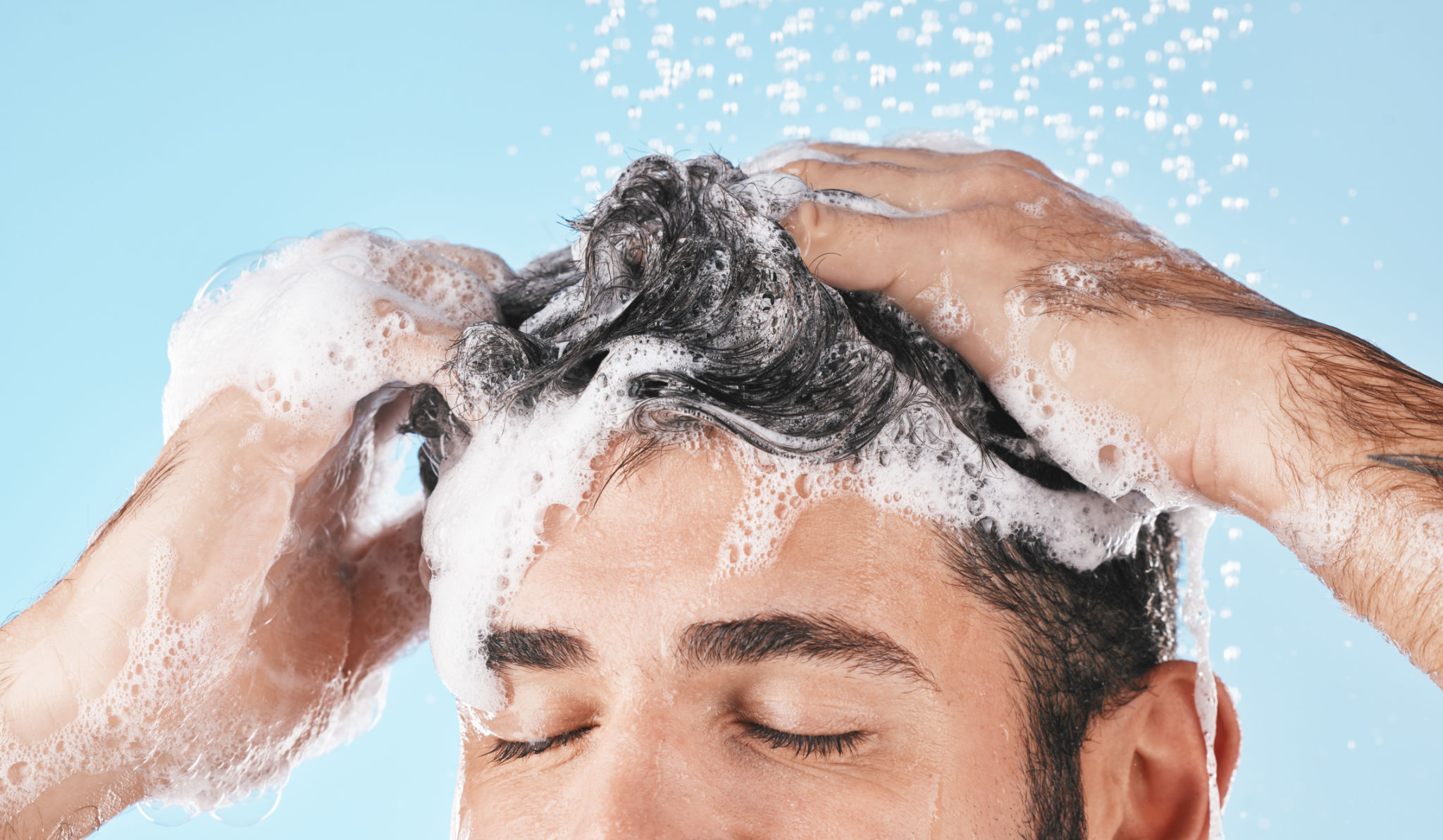 man washing hair
