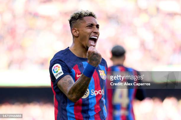 Raphinha of FC Barcelona celebrates after scoring his team's first goal during the LaLiga Santander match between FC Barcelona and Valencia CF at...