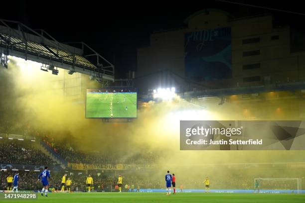 General view of the inside of the stadium as fans of Borussia Dortmund use smoke flares during the UEFA Champions League round of 16 leg two match...