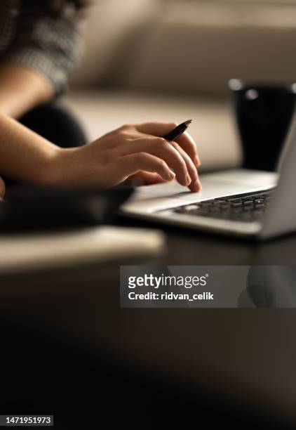 closeup cropped image student girl hands typing using laptop - training class stockfoto's en -beelden