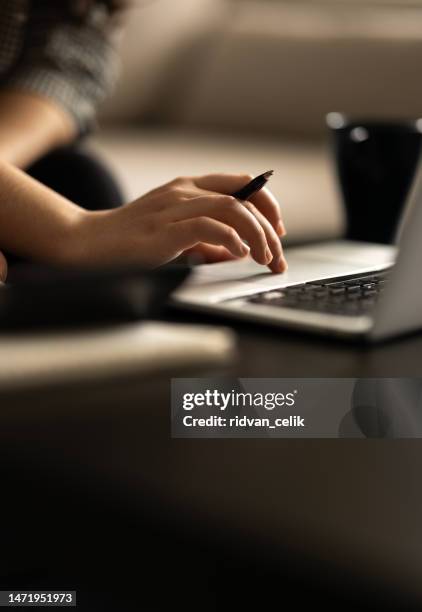 closeup cropped image student girl hands typing using laptop - school children in classroom using a computer stock pictures, royalty-free photos & images