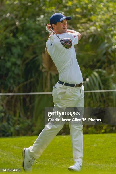 Adam Scott tees off from the 15th tee in a practice round prior to THE PLAYERS Championship on THE PLAYERS Stadium Course at TPC Sawgrass on March 7,...