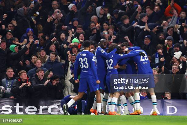 Raheem Sterling of Chelsea celebrates with teammates after scoring the team's first goal during the UEFA Champions League round of 16 leg two match...