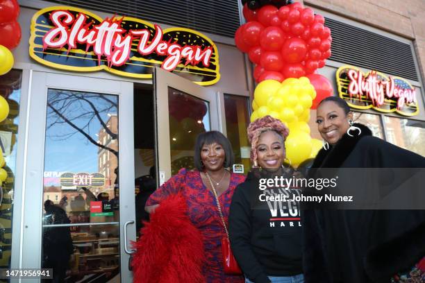 Bevy Smith, Pinky Cole, and Melba Wilson attend the Grand Opening of Slutty Vegan's Harlem location on March 07, 2023 in New York City.