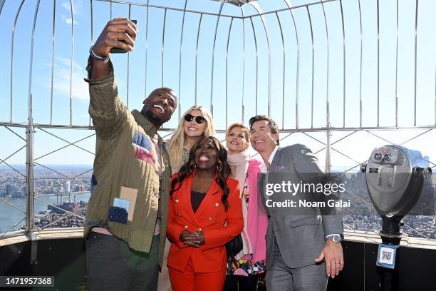 Akbar Gbajabiamila, Amanda Kloots, Sheryl Underwood, Natalie Morales, and Jerry O'Connell attend as "The Talk" hosts visit the Empire State Building...