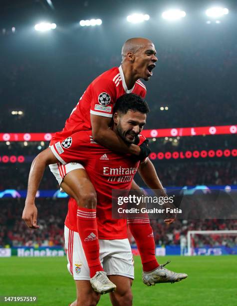 Goncalo Ramos of SL Benfica celebrates with teammate Joao Mario after scoring the team's second goal during the UEFA Champions League round of 16 leg...