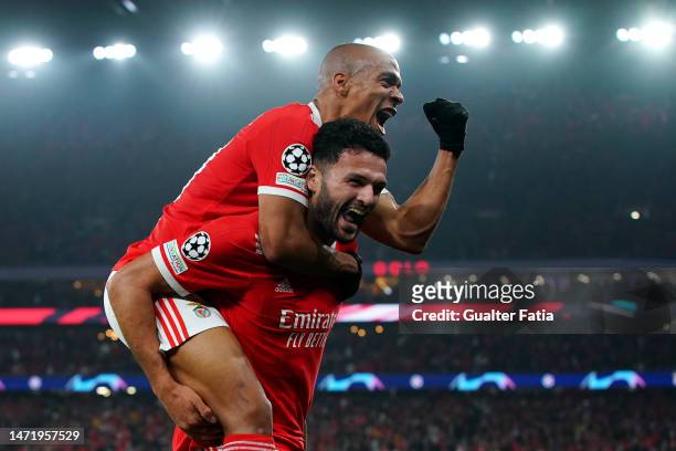 Goncalo Ramos of SL Benfica celebrates with teammate Joao Mario after scoring the team's second goal during the UEFA Champions League round of 16 leg...