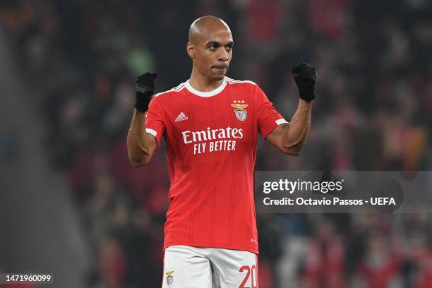 Joao Mario of SL Benfica celebrates after scoring the team's fourth goal from a penalty kick during the UEFA Champions League round of 16 leg two...