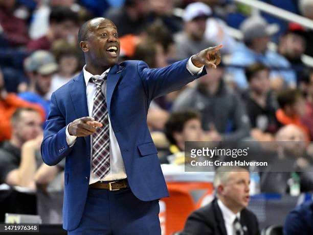 Head coach Earl Grant of the Boston College Eagles directs his team against the Louisville Cardinals during the second half in the first round of the...