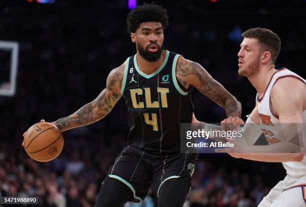 Nick Richards of the Charlotte Hornets dribbles against Isaiah Hartenstein of the New York Knicks during their game at Madison Square Garden on March...