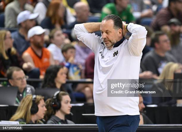 Head coach Mike Brey of the Notre Dame Fighting Irish reacts during the second half of their game against the Virginia Tech Hokies in the first round...