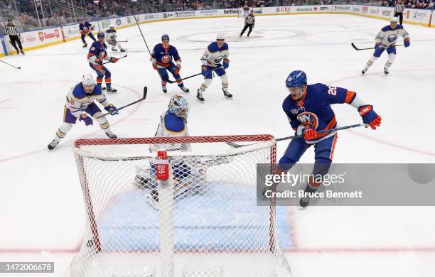 Hudson Fasching of the New York Islanders scores the game-winning goal during the third period against the Buffalo Sabres at the UBS Arena on March...