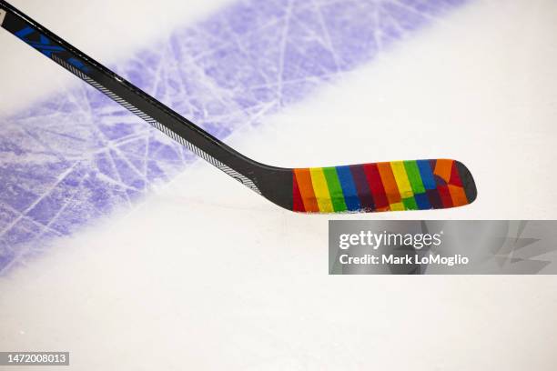 Players from the Tampa Bay Lightning skate during warmups with special hockey tape for Pride Night against the Philadelphia Flyers at Amalie Arena on...
