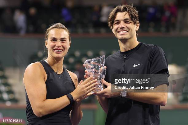 Aryna Sabalenka and Taylor Fritz of USA celebrate with the Eisenhower Cup after taking the Tie Break Tens title during the BNP Paribas Open on March...