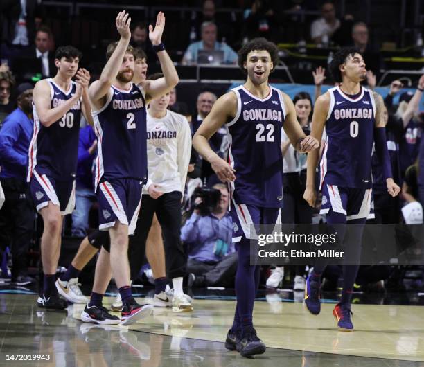 Abe Eagle, Drew Timme, Anton Watson and Julian Strawther of the Gonzaga Bulldogs celebrate as time expires in their 77-51 victory over the Saint...