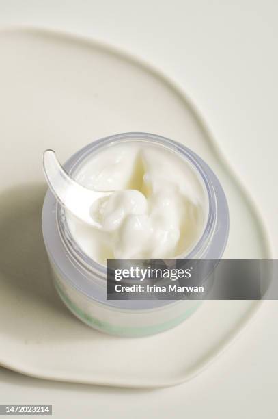 skin care face cream, moisturizer, lotion - spatula stock pictures, royalty-free photos & images