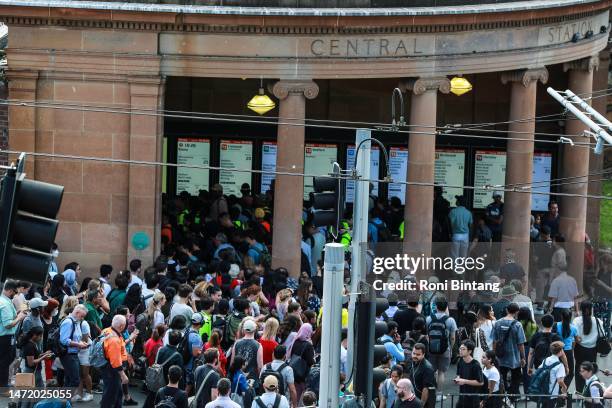 Commuters mill about at Central Station on March 08, 2023 in Sydney, Australia. Sidney trains ground to a halt shortly before the afternoon peak due...