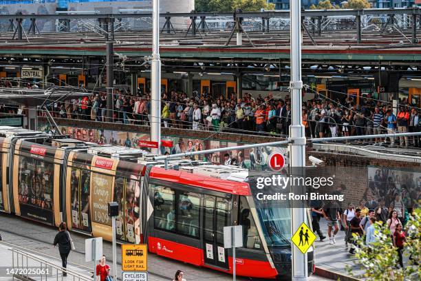 Commuters mill about at Central Station on March 08, 2023 in Sydney, Australia. Sidney trains ground to a halt shortly before the afternoon peak due...